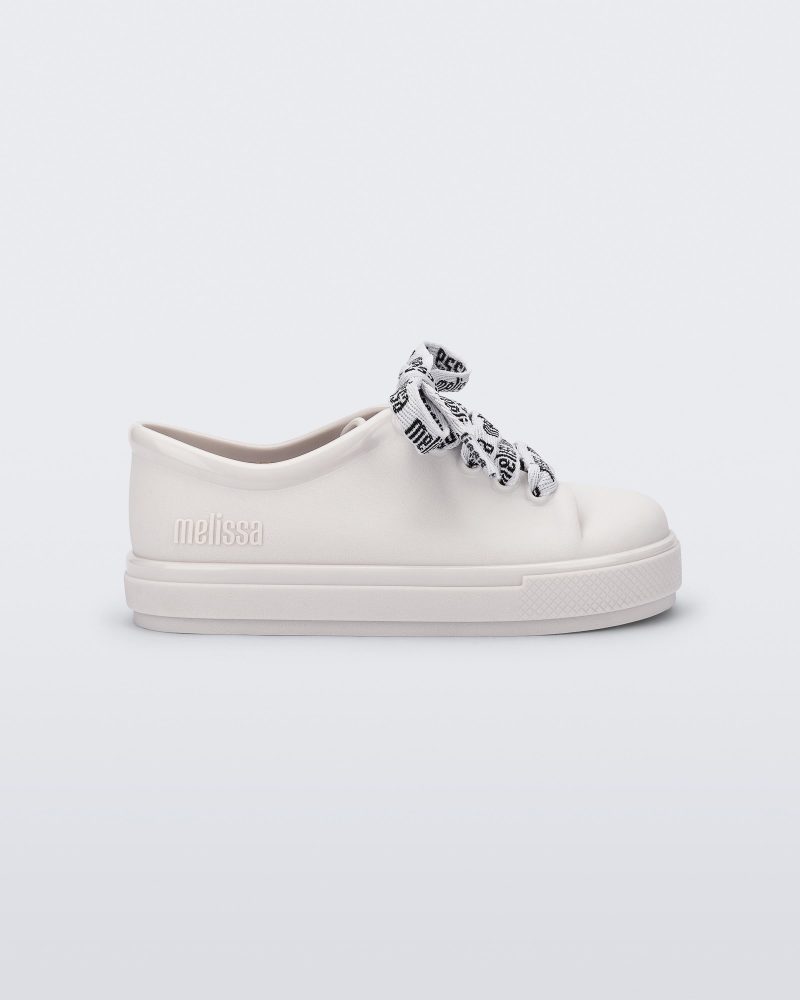 Side view of a white baby Hip M Lover sneaker with laces