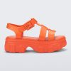 Side view of a orange Ella platform adult sandal