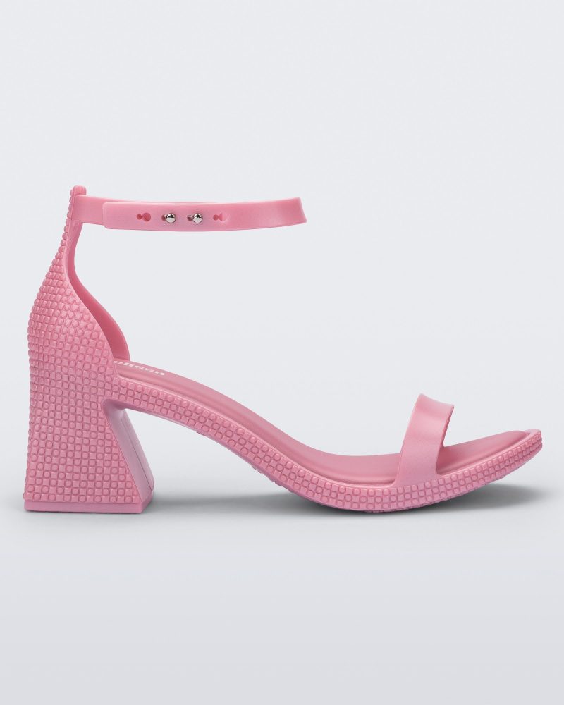 Side view of a metallic pink Lux Heel