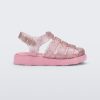 Side view of a glitter pink Megan baby sandal.