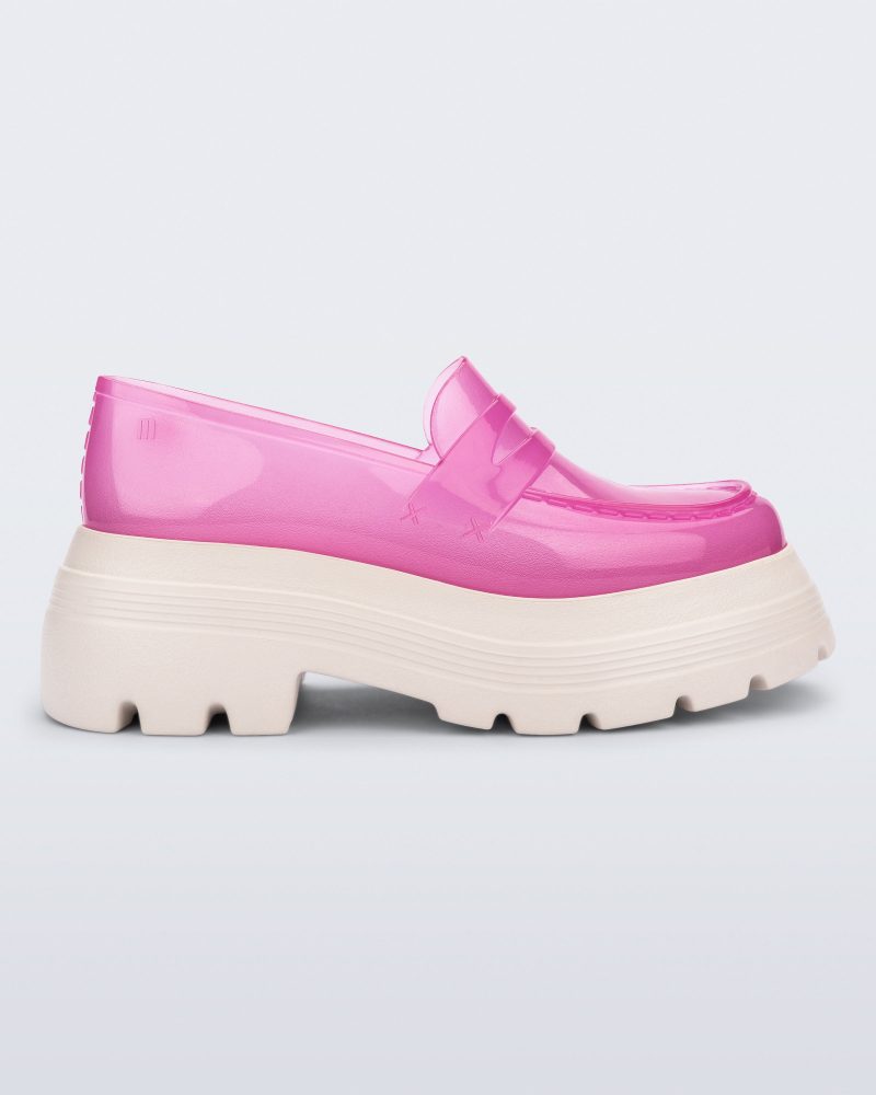 Side view of a transparent pink Royal High + Undercover platform loafer with beige sole.