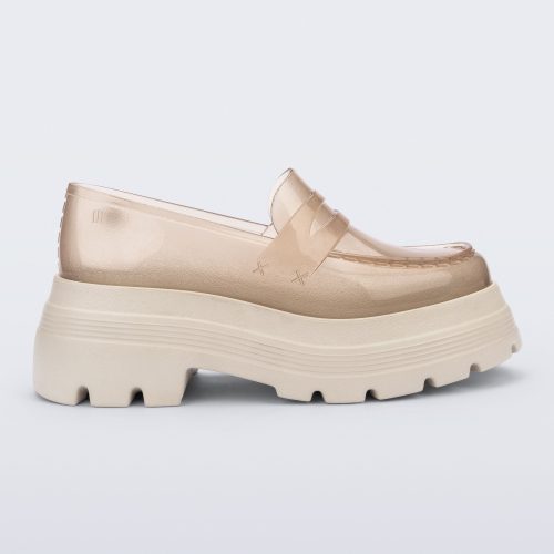 Side view of a transparent beige Royal High + Undercover platform loafer with beige sole. 