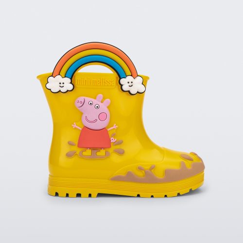 Side view of a yellow Welly Peppa Pig rain boot