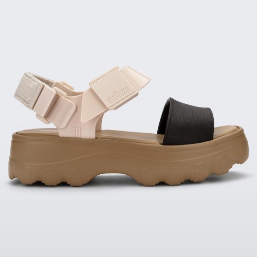 Side view of a Beige/Black Melissa Kick Off Platform Sandals with a brown sole and two black and tan straps.