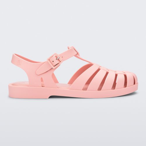 Side view of a light pink Possession sandal