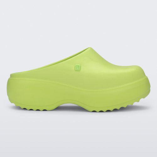 Side view of a green Free Clog Platform.