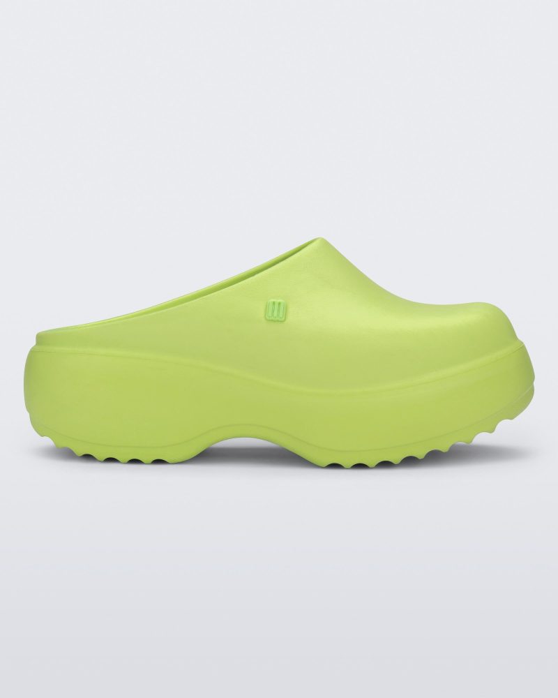 Side view of a green Free Clog Platform.