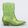 Side view of a pearly green Texas boot with pointed toe.