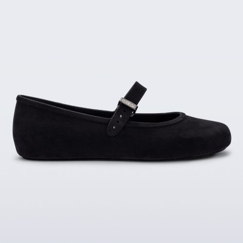 Side view of a black Soft Ballerina Velvet flat.