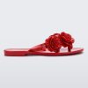 Side view of a red Harmonic Springtime women's flip flop with 3 red flowers.