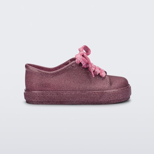 Side view of a glitter pink baby Hip M Lover sneaker with laces