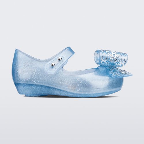 Side view of a pearly blue/glitter baby Ultragirl frozen flat.