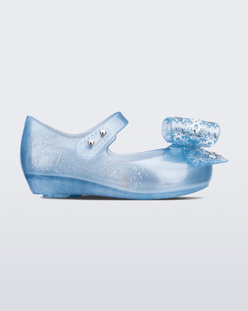 Side view of a pearly blue/glitter baby Ultragirl frozen flat.