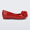 Side view of a red Ultragirl Springtime kids flat with two red flowers and peep toe.