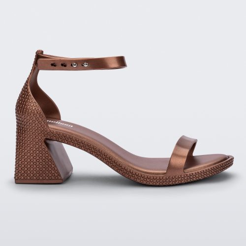 Side view of a metallic copper Lux Heel