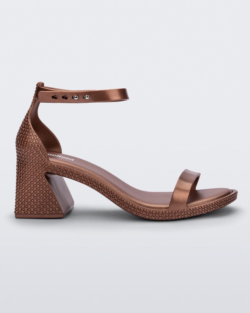 Side view of a metallic copper Lux Heel