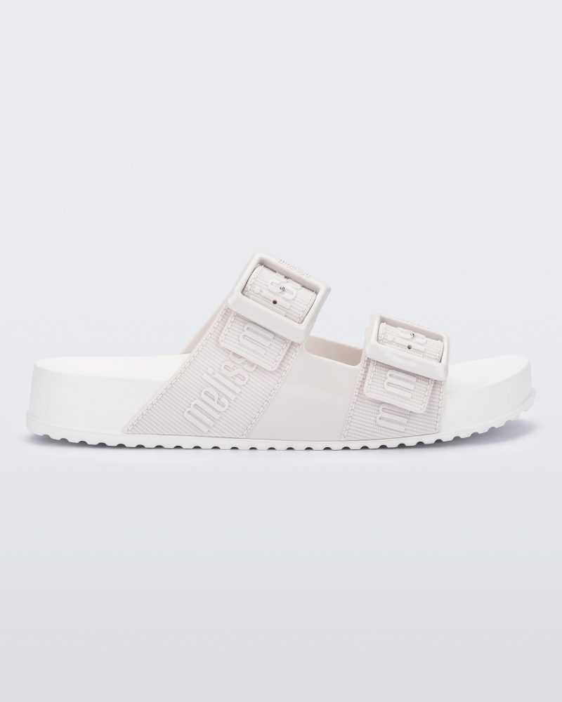 Side view of a white Cozy M Love adult slide