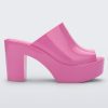 Side view of a pink Melissa Mule platform heel.