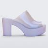 Side view of a pearly white Melissa Mule platform heel.