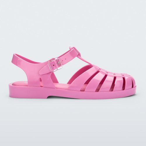 Side view of a pink Melissa Possession sandal with a fisherman sandal design