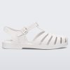 Side view of a white Melissa Possession sandal with several straps and a closed toe front.