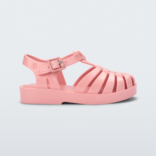 Side view of a light pink baby Possession sandal