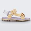 Side view of a purple soled Melissa Papete sandal with yellow and purple straps.