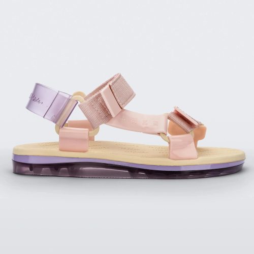 Side view of a yellow soled Melissa Papete sandals with pink and transparent purple straps.