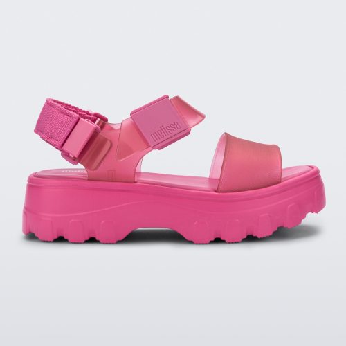 Side view of a pink/clear pink Melissa platform Kick Off sandal with two straps.