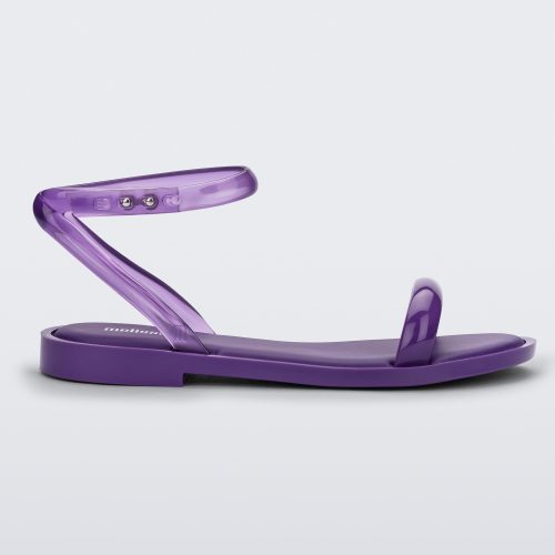 Side view of a purple Melissa Wave Sandal with a purple front strap and clear purple ankle strap.