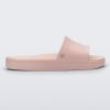 Side view of a light pink Melissa Beach slide.