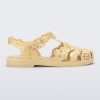 Side view of a Melissa Possession fisherman sandal in yellow with cut out lace detail on the straps.