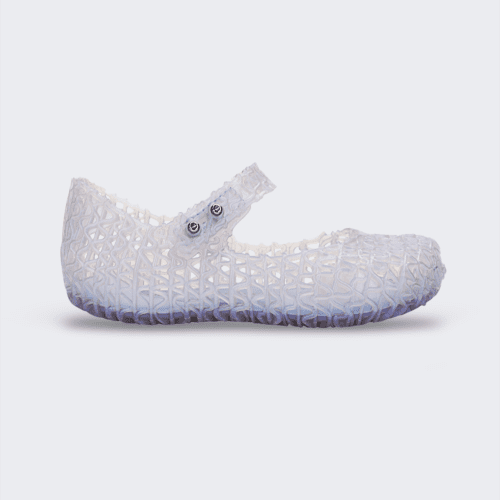 Side view of a Mini Melissa Campana ballet flat in clear