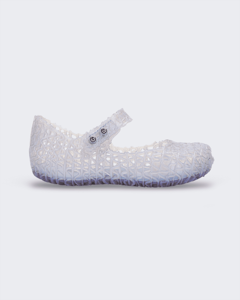 Side view of a Mini Melissa Campana ballet flat in clear