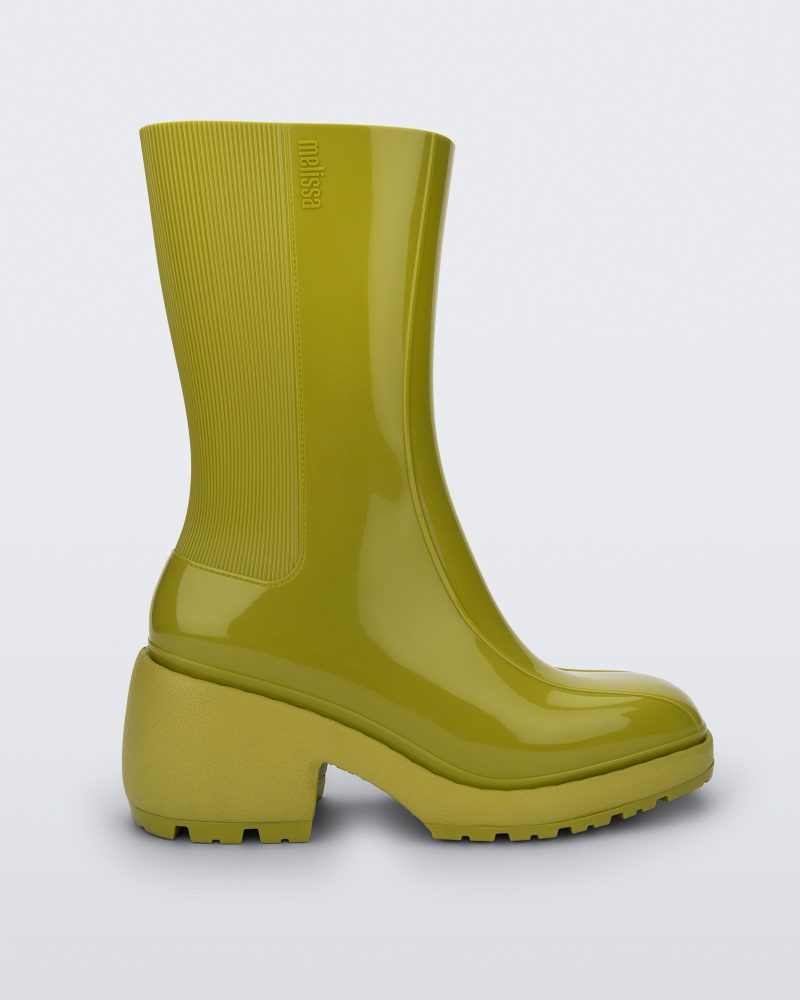 Side view of a green Melissa Nancy rain boot.