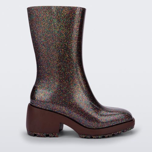 Side view of multicolor glitter Melissa Nancy boots with brown sole.