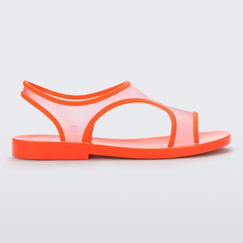 Side view of a transparent orange Melissa Bikini Sandal with two transparent orange straps conjoining in the middle and an orange insole.