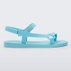 Side view of a Melissa Sun Downtown sandal with light blue front cross and back ankle straps.