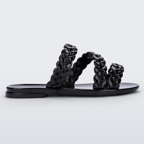 Side view of a black Melissa Wrap slide with 3 braid like straps.