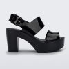 Side view of a black Melissa Mule heel platform sandal.