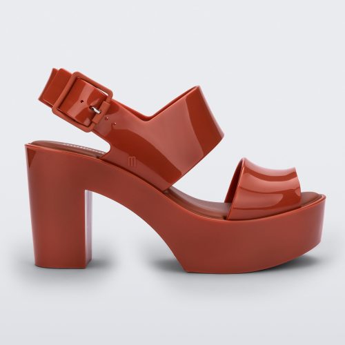 Side view of a red Melissa Mule heel platform sandal.