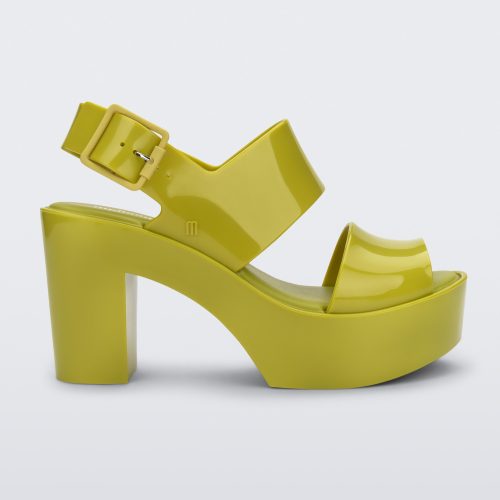 Side view of a green Melissa Mule heel platform sandal.