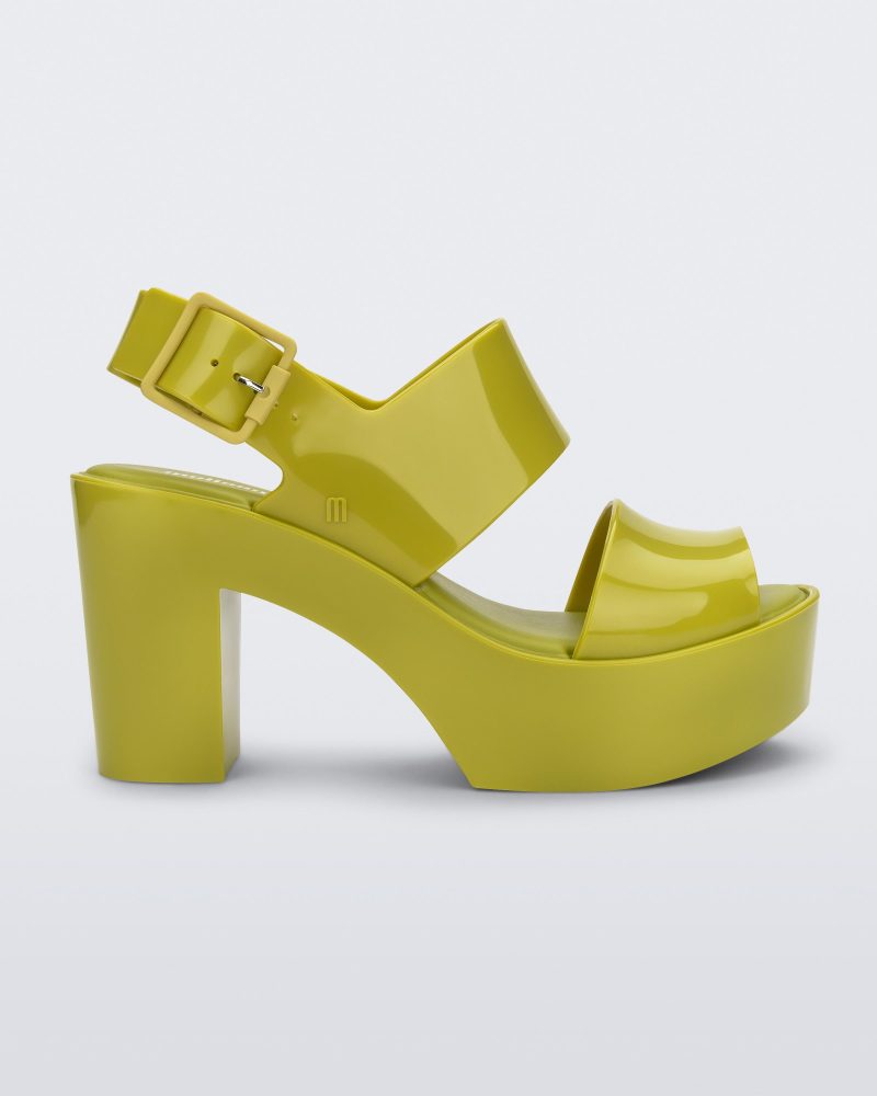 Side view of a green Melissa Mule heel platform sandal.