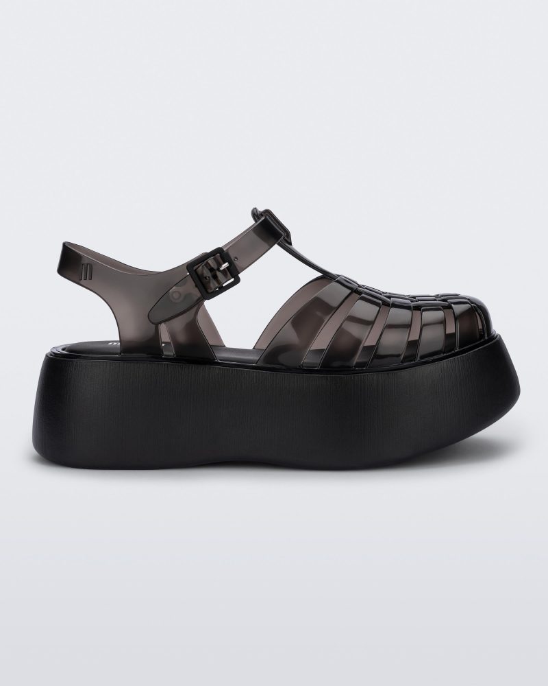 Side view of a black Melissa Possession Platform sandal with several straps and a closed toe front.