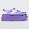 Side view of a lilac Melissa Possession Platform sandal with several straps and a closed toe front.