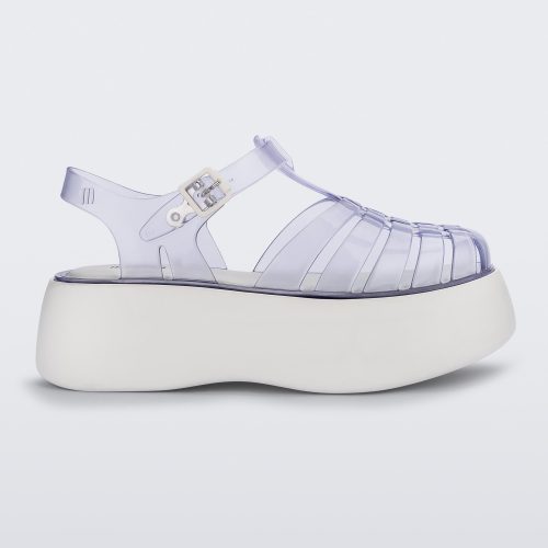 Side view of a Clear/White Melissa Possession Platform sandal with several straps and a closed toe front.