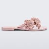 Side view of a light pink Melissa Harmomic Squared Garden flip flop with flowers on the straps.