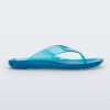 Side view of a clear blue Melissa Real Jelly Flip Flop.