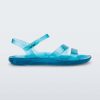 Side view of a blue Melissa Real Jelly Sandal with two front straps and an ankle strap.