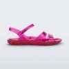 Side view of a pink Melissa Real Jelly Sandal sandal with two front straps and an ankle strap.